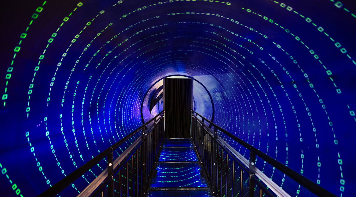 Interactive light tunnel walkway in Lumi’s Kids Club at XO Cape Arnna