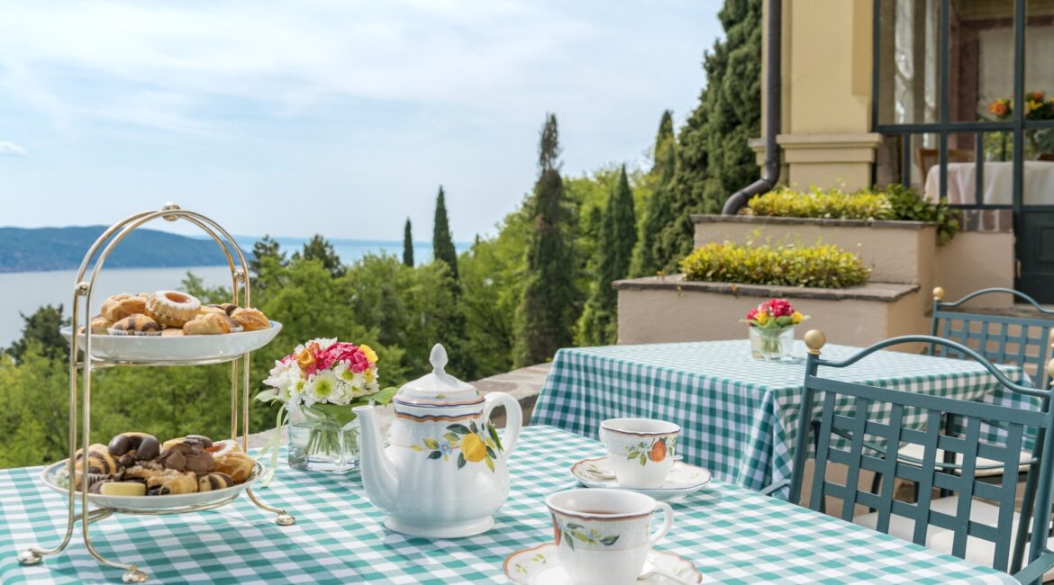 Balcony terrace at Villa Sostaga overlooking the blue waters of Lake Garda