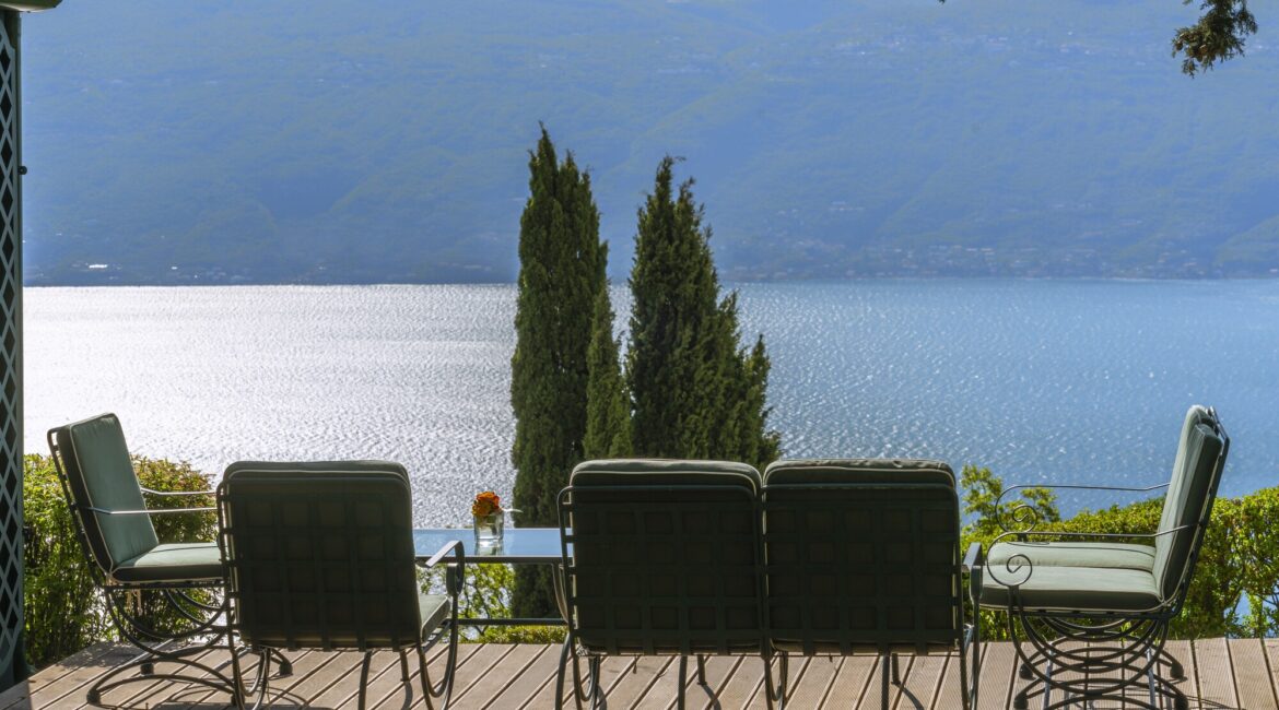 Decadent seating area overlooking Lake Garda at Villa Sostaga boutique hotel
