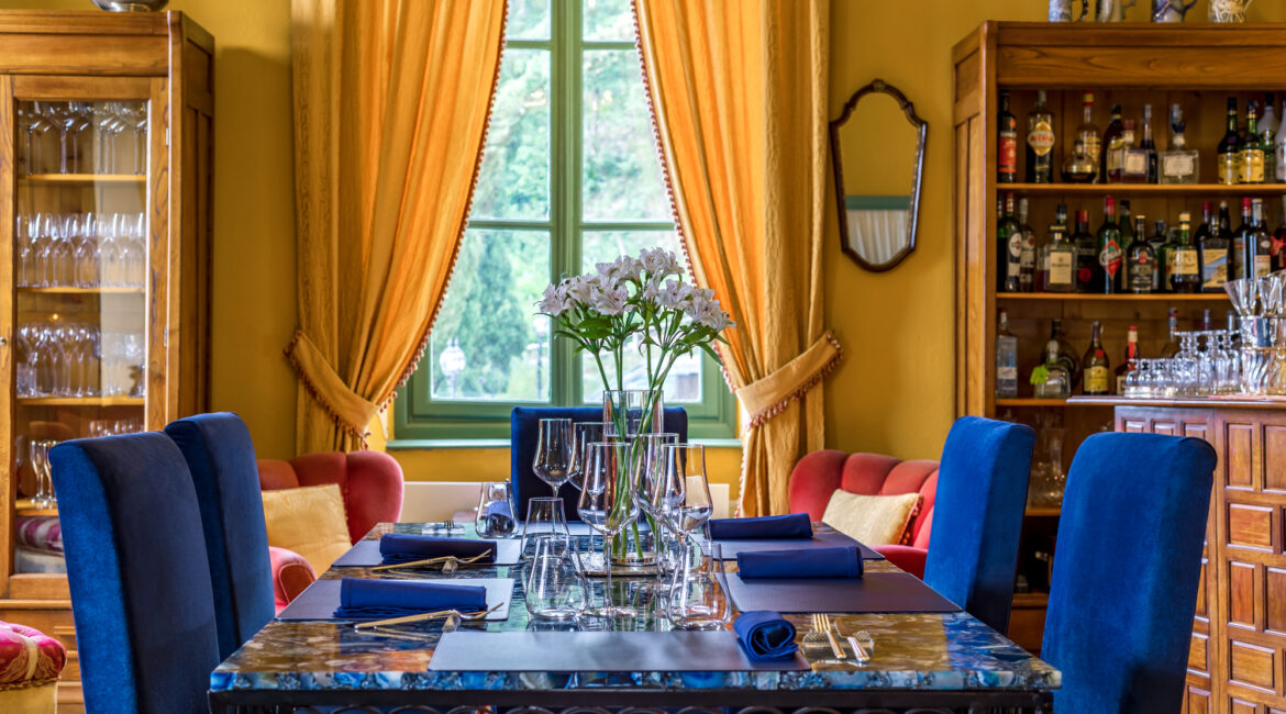 Restaurant interior at Villa Sostaga with classic Italian elegance