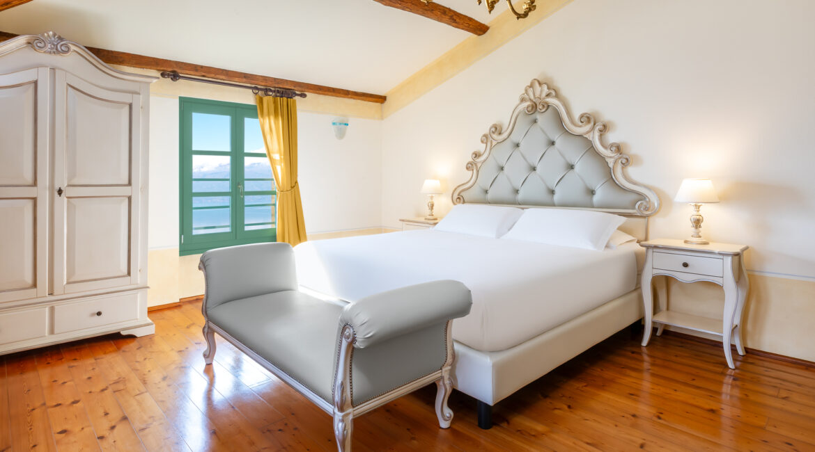 Romantic bedroom suite at Villa Sostaga boutique hotel on Lake Garda