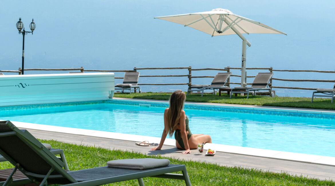 Stunning pool at Villa Sostaga with panoramic views across Lake Garda