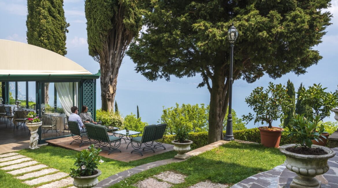 Villa Sostaga surrounded by woodland and gardens above Lake Garda