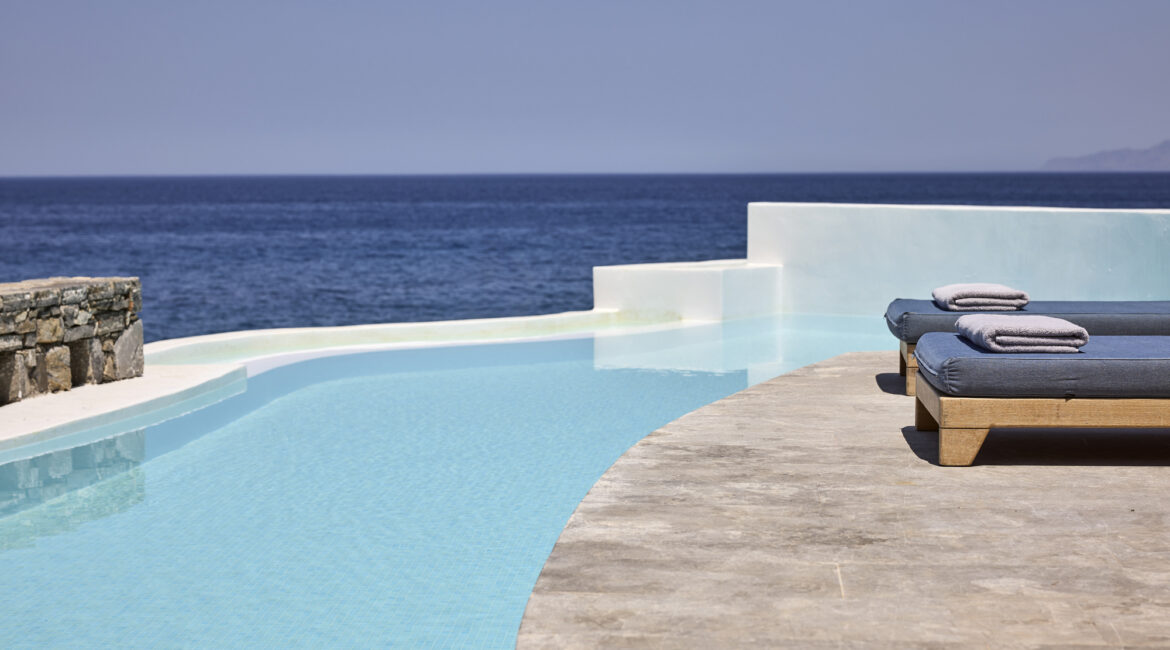 Club Studio private pool seafront view at St Nicolas Bay, Crete with private infinity pool by the water