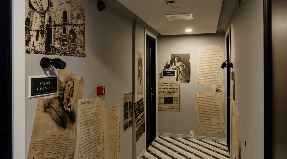 Characterful corridor at Hotel Poem, Istanbul, with vintage photography of the city