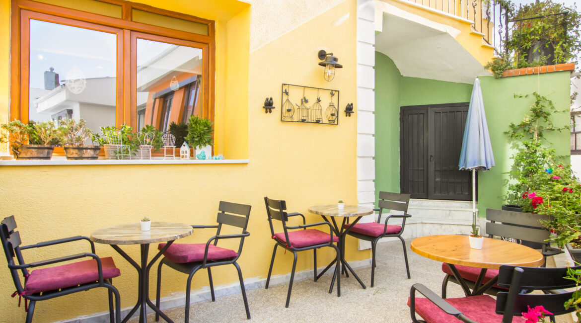 Courtyard breakfast space at Hotel Poem, Istanbul, with vibrant seating