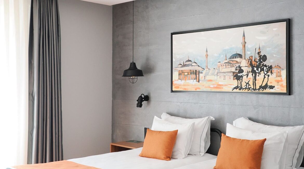Spacious premier room at Hotel Poem in Istanbul with king-size bed, soft tones and garden patio access