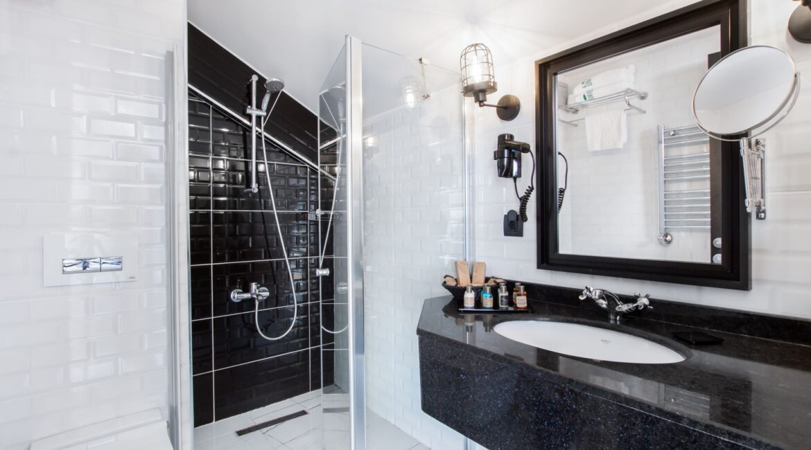 Modern penthouse bathroom at Hotel Poem, Sultanahmet, with walk-in shower and marble finishes