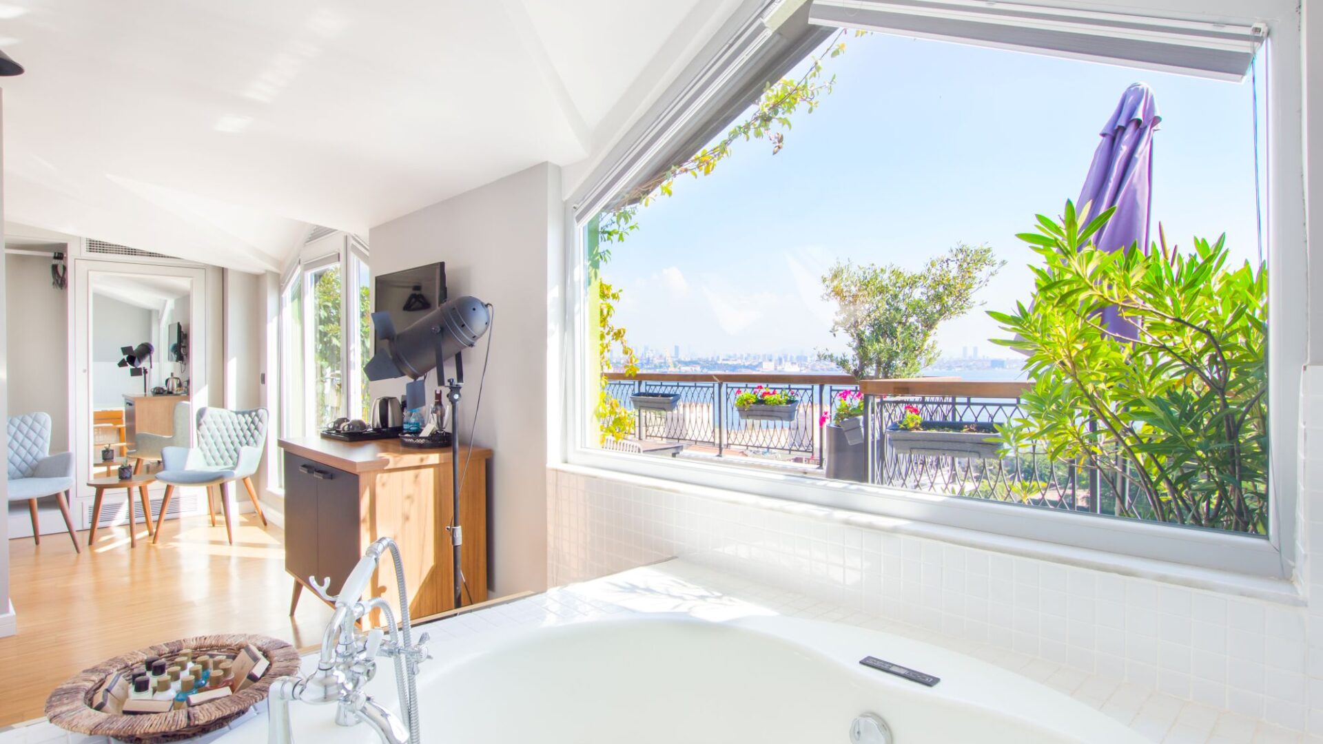 Penthouse bathroom at Hotel Poem, Sultanahmet, with whirlpool bath and views towards the sea