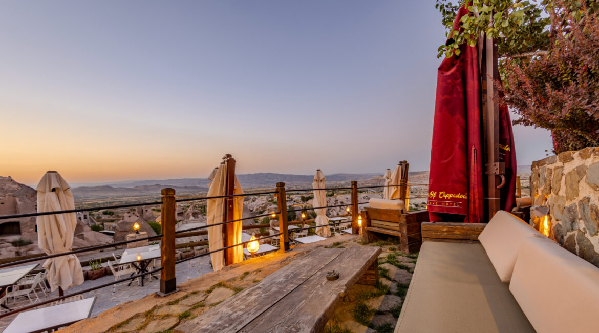 Private terrace at sunset overlooking Cappadocia’s rock formations near Uchisar