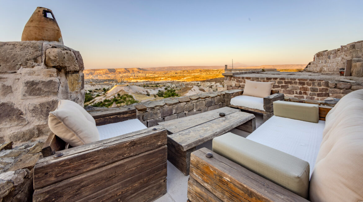 Terrace seating with panoramic views across Cappadocia’s valleys