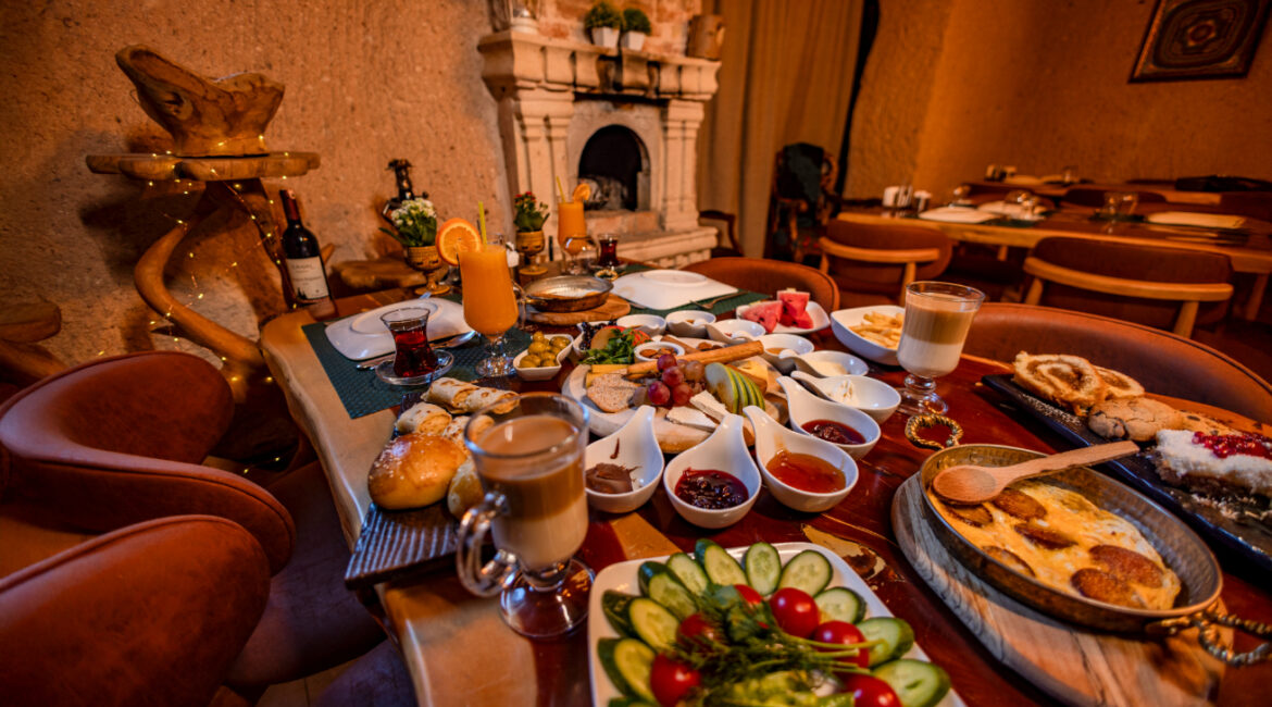 Authentic kahvaltı breakfast with a variety of Turkish dishes in a cosy dining setting