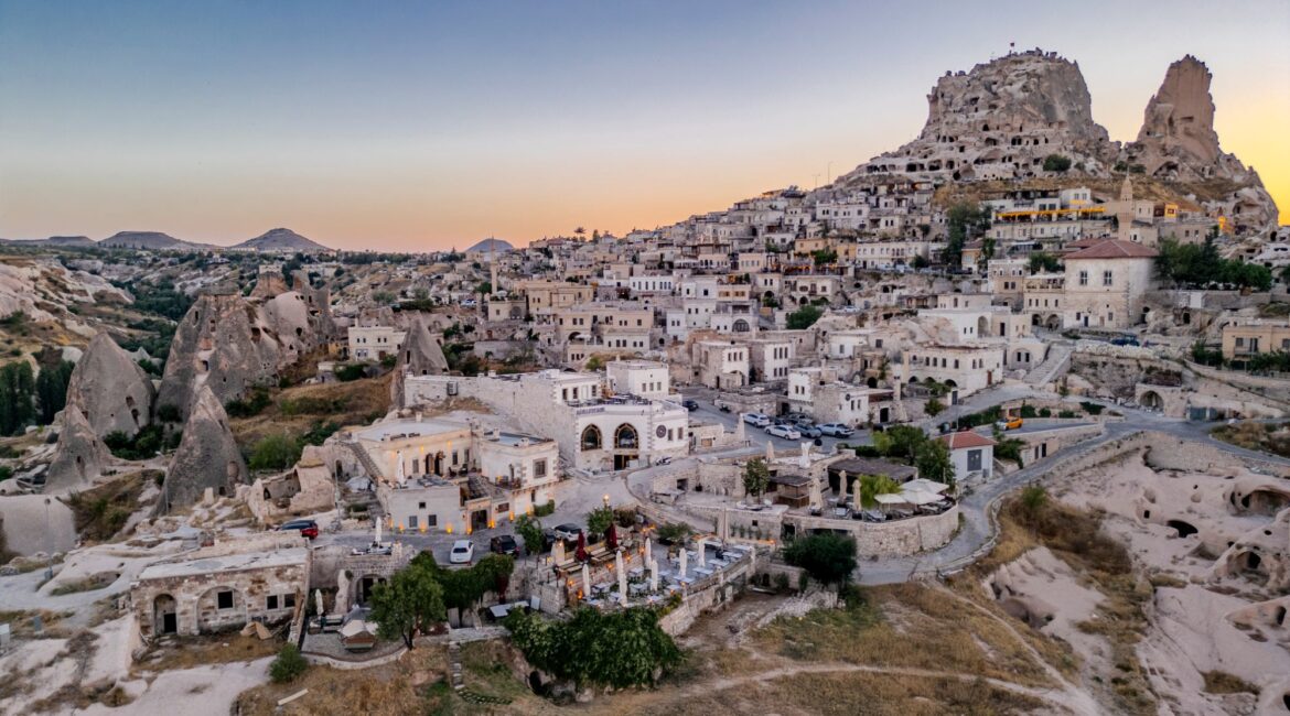 Drone view of Uchisar village with traditional stone houses and cave dwellings