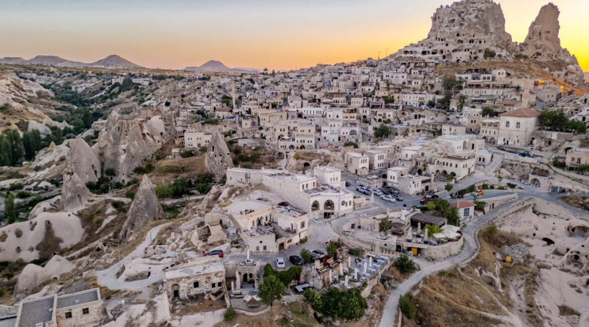 Panoramic aerial view of Uchisar village and Cappadocia’s unique rock formations