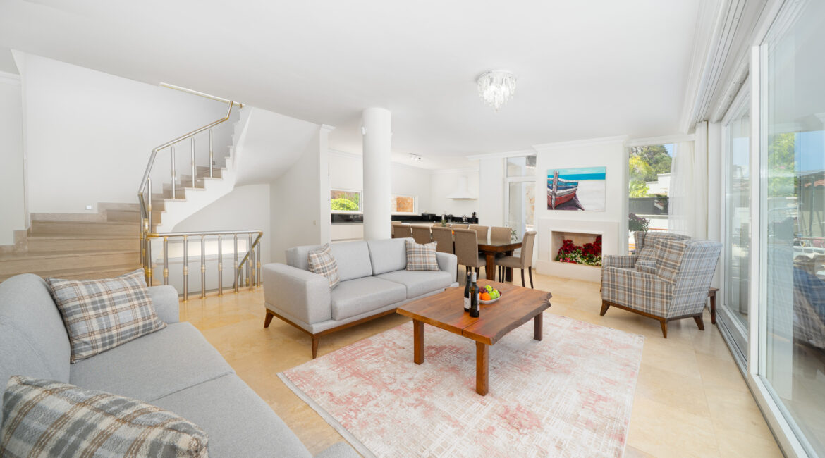 bright and airy living room at Villa Cennet Koy Kalkan with seating area and terrace access
