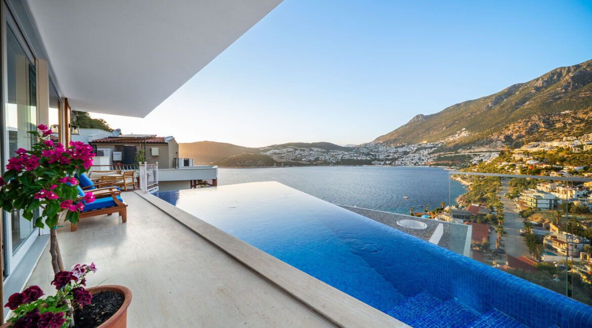 Infinity pool at Villa Cennet Koy Kalkan with views across Kalkan Bay towards the harbour