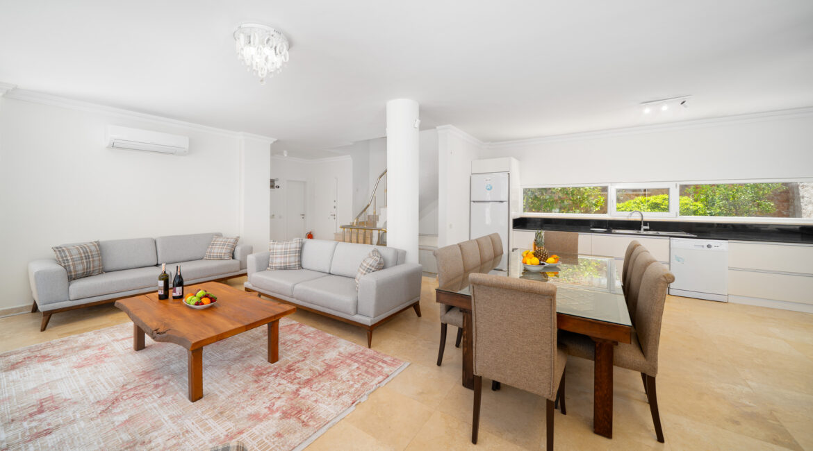Open-plan living and dining area at Villa Cennet Koy Kalkan with modern interiors