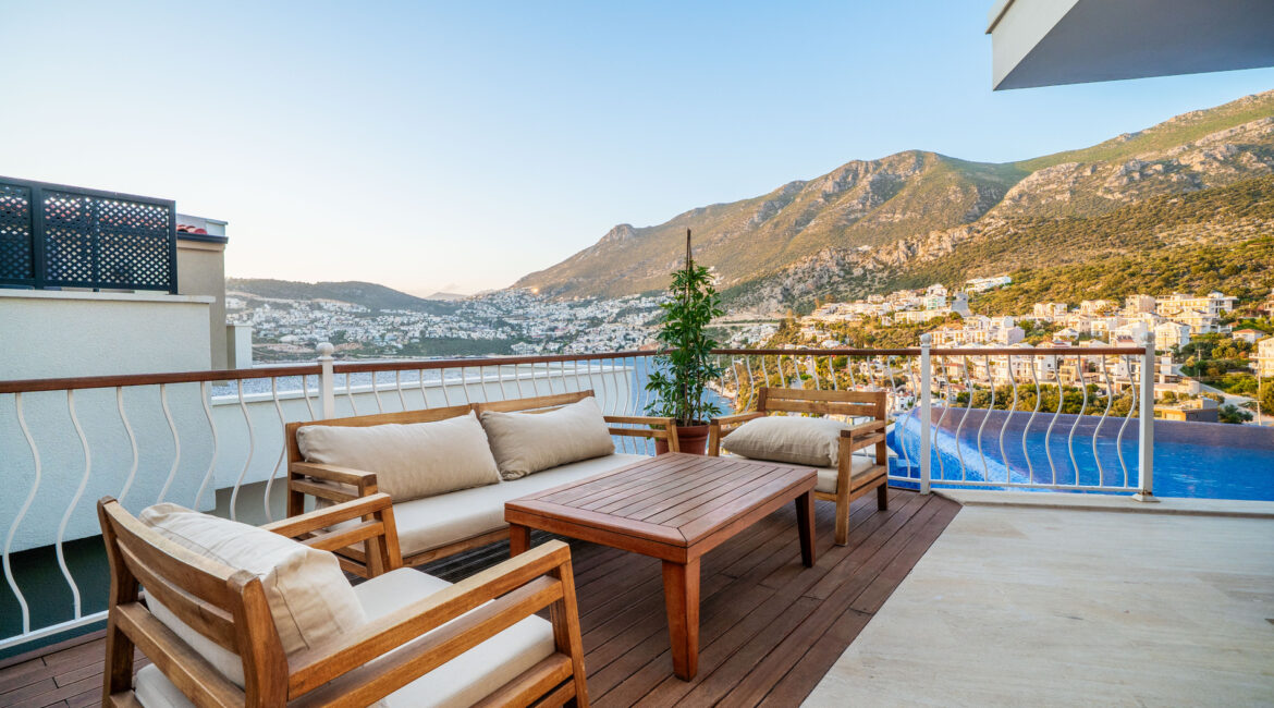 Outdoor seating terrace at Villa Cennet Koy Kalkan with views over the mountains