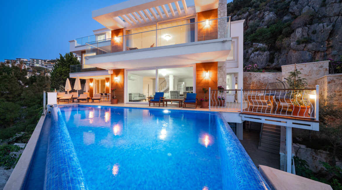Wrap around terrace at Villa Cennet Koy Kalkan with sun loungers and outdoor seating area