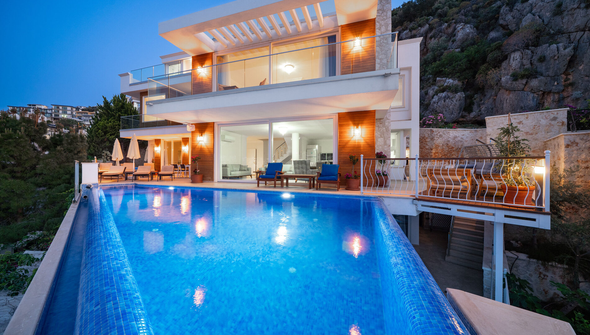 Wrap around terrace at Villa Cennet Koy Kalkan with sun loungers and outdoor seating area