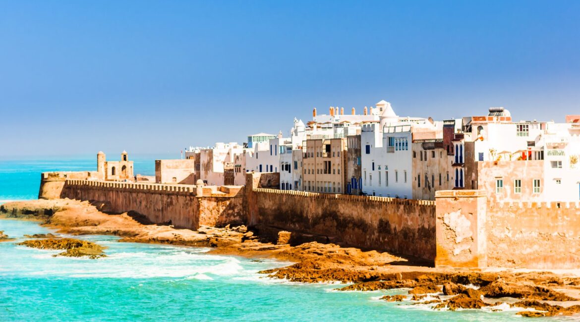 Turquoise water and sandy shoreline along the Essaouira coast