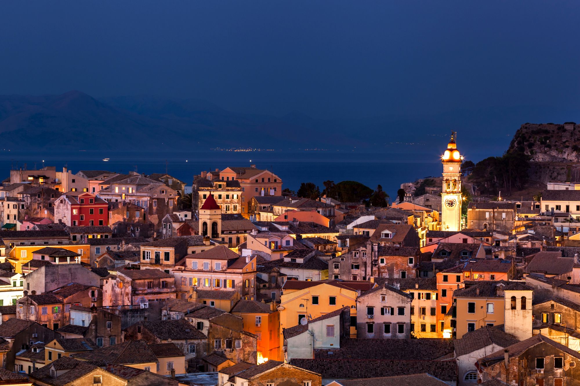 Panoramic night view over Corfu Town and its historic Venetian quarter