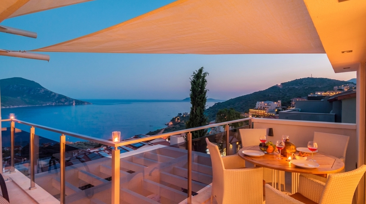Sunset dining terrace and sweeping sea views at Topaz Penthouse in Kalkan