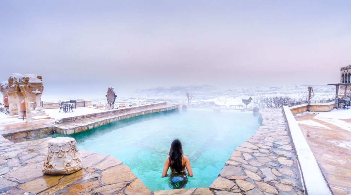 Winter views across the heated outdoor pool at Museum Hotel Cappadocia