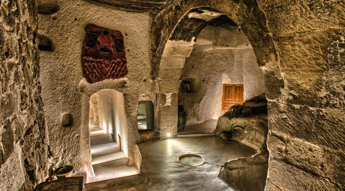 Historic cave interiors and stone architecture at Museum Hotel Cappadocia