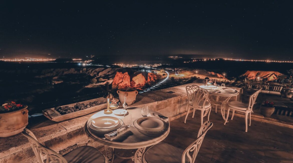 Private dining terrace at Museum Hotel Cappadocia with panoramic night views