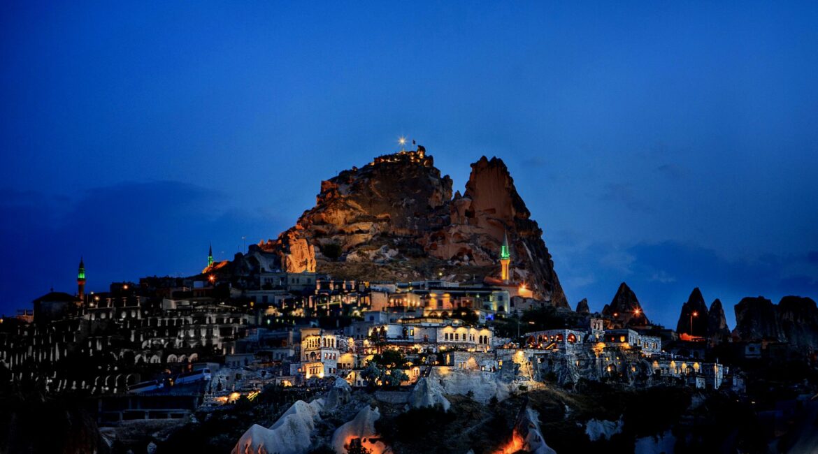 Night view across Uchisar and Museum Hotel Cappadocia