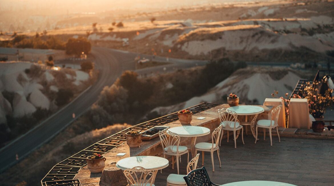 Sunrise terrace views across Cappadocia at Museum Hotel in Uchisar