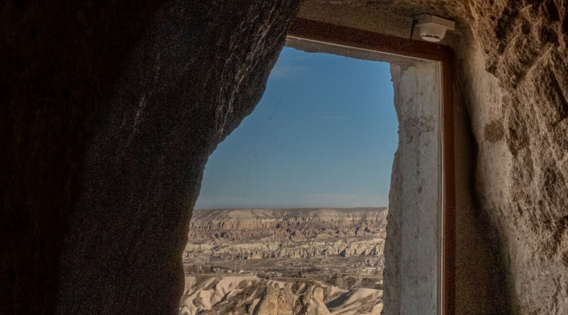 Cave window views across Cappadocia at Museum Hotel in Uchisar