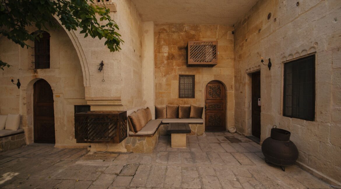 Traditional stone courtyard at Yunak Evleri Cave Hotel