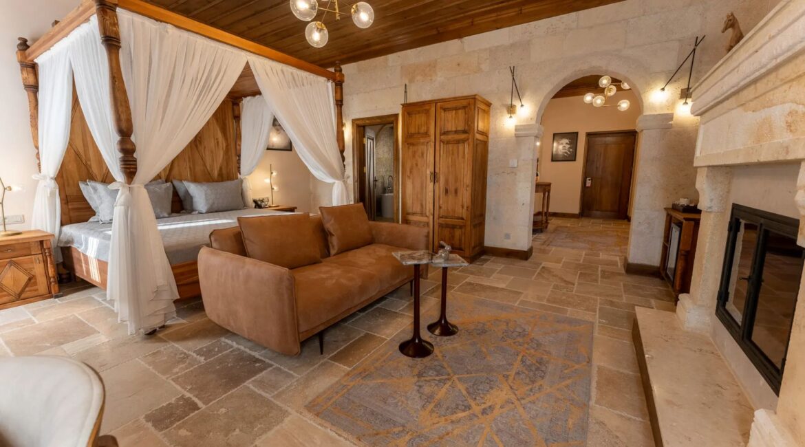Spacious suite with fireplace at Asmali Konak Cave Suites in Urgup, Cappadocia