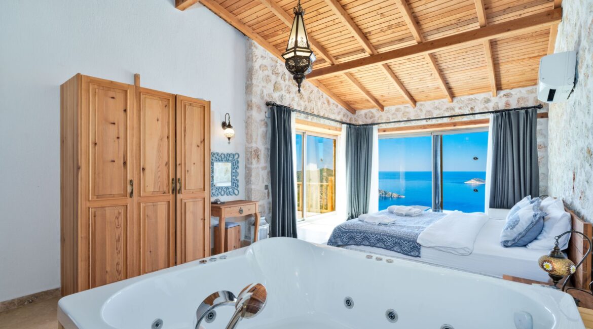 Bedroom with jacuzzi bath and sea views at Villa Sedir Ev