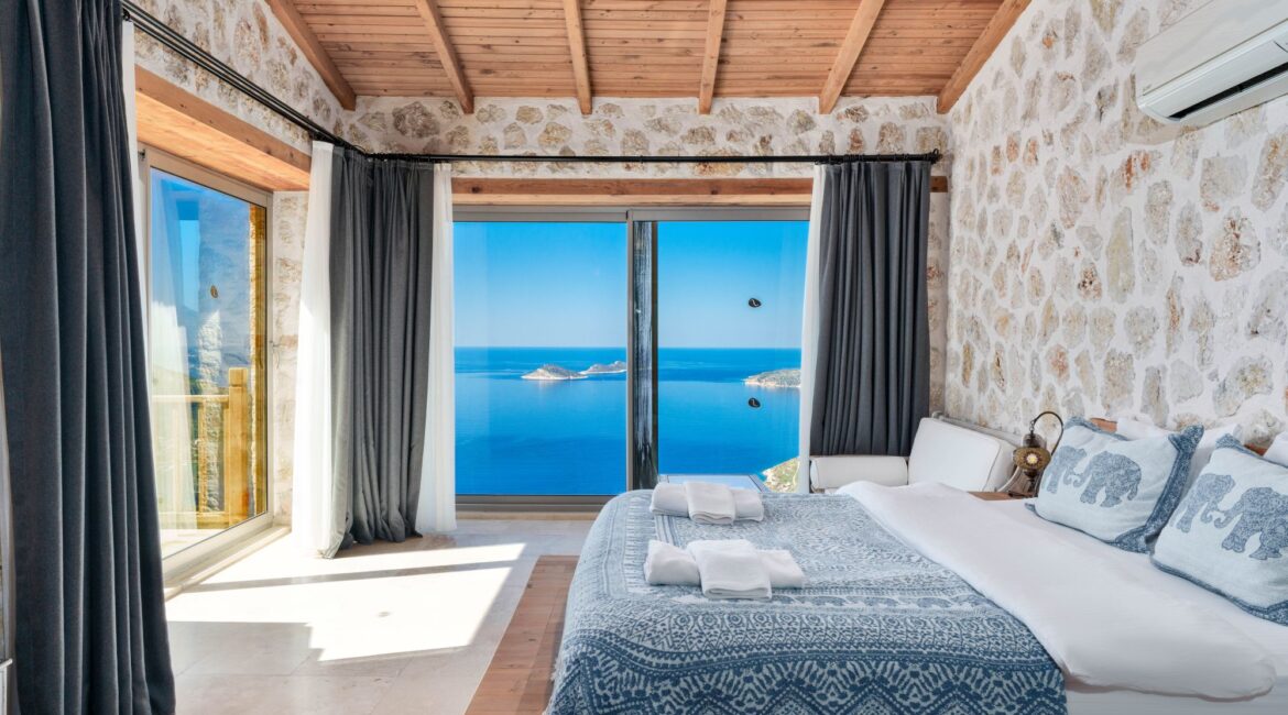 Bedroom with panoramic views across Kalkan Bay at Villa Sedir Ev
