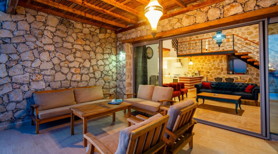 Covered lounge terrace with sea views at Villa Sedir Ev