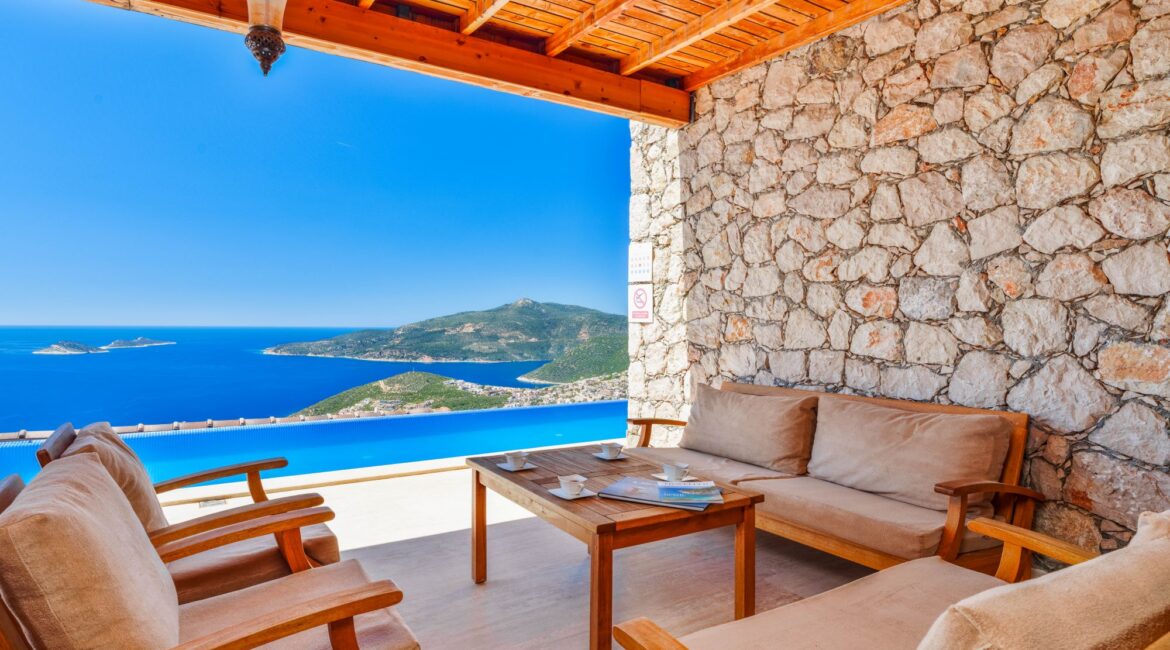 Covered terrace seating area at Villa Sedir Ev with sea views