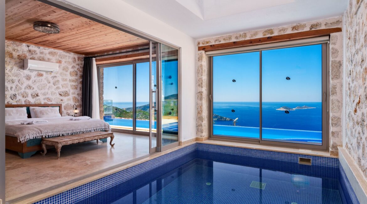 Bedroom suite with private indoor pool at Villa Sedir Ev