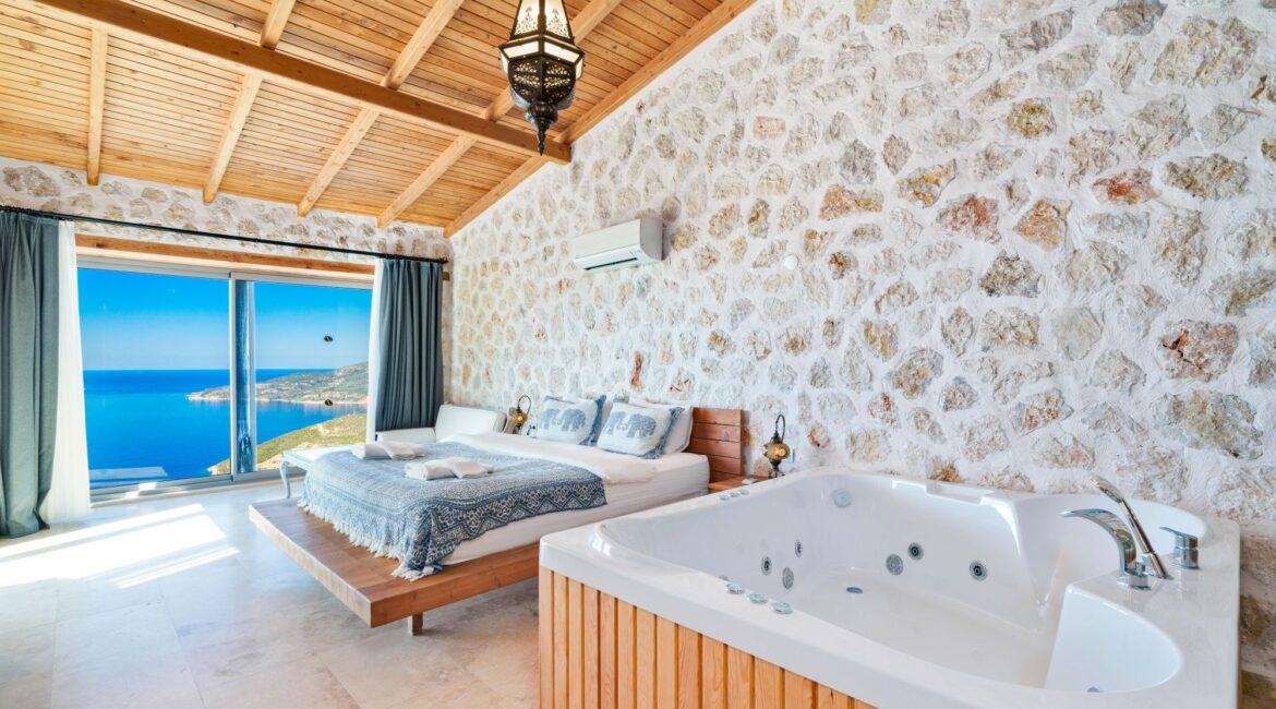 Master bedroom with jacuzzi bath at Villa Sedir Ev, Kalkan