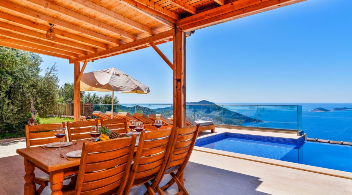 Outdoor dining terrace at Villa Sedir Ev overlooking Kalkan Bay