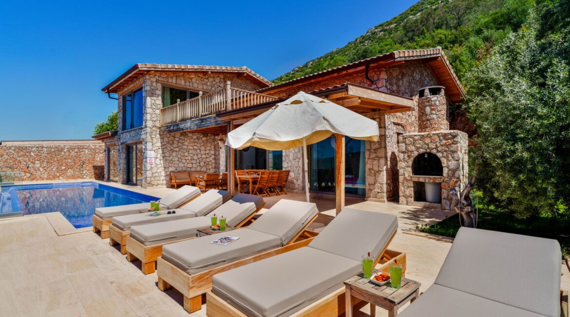 Poolside sun loungers at Villa Sedir Ev, Kalkan