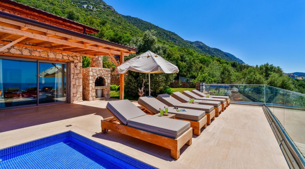 Sun loungers beside the private pool at Villa Sedir Ev