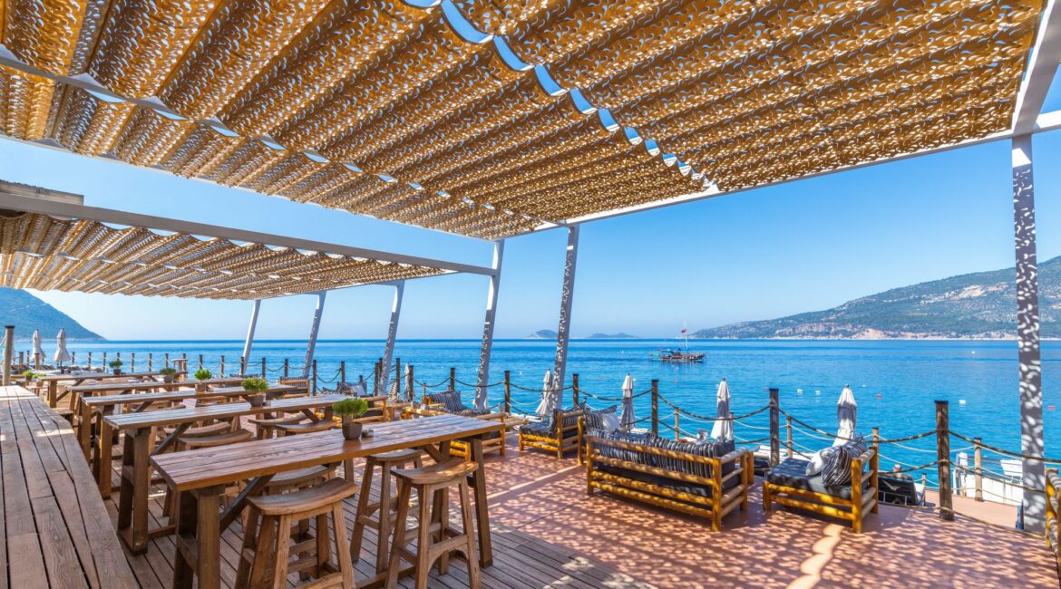 Sea-view dining terrace at The Lures Beach Club, Kalkan