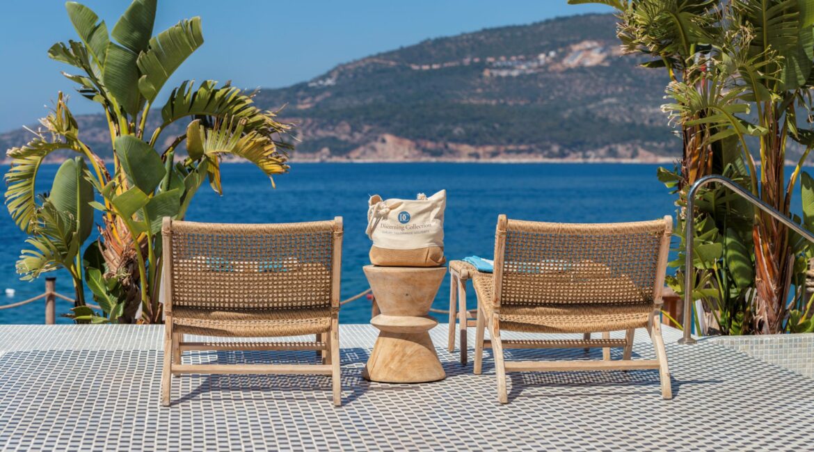 Beach club sun loungers with views across Kalamar Bay