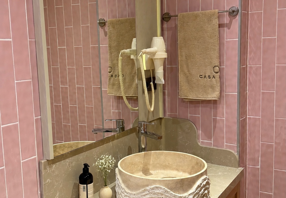 Luxury bathroom detail at Casa Pery Kalkan with handcrafted basin, natural stone finishes and boutique design.