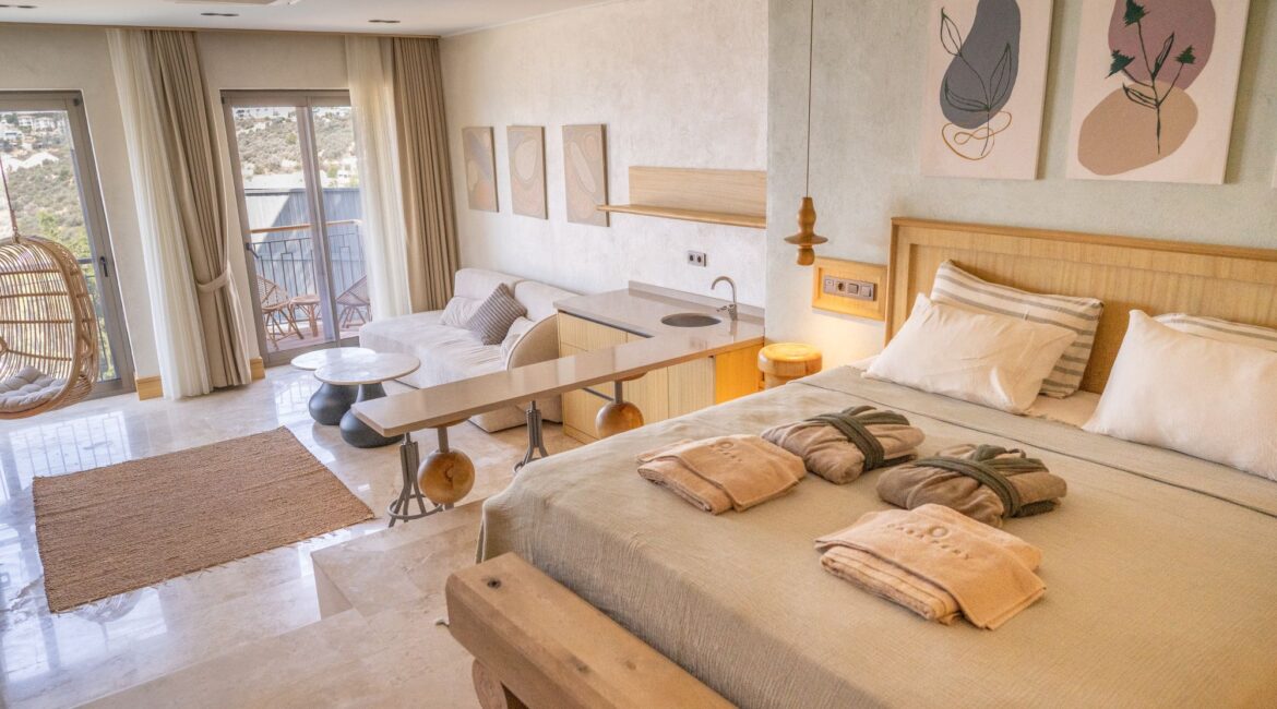 Suite Livia (Room 4) at Casa Pery in Kalkan featuring a split-level bedroom, handcrafted furnishings and contemporary Mediterranean interiors.