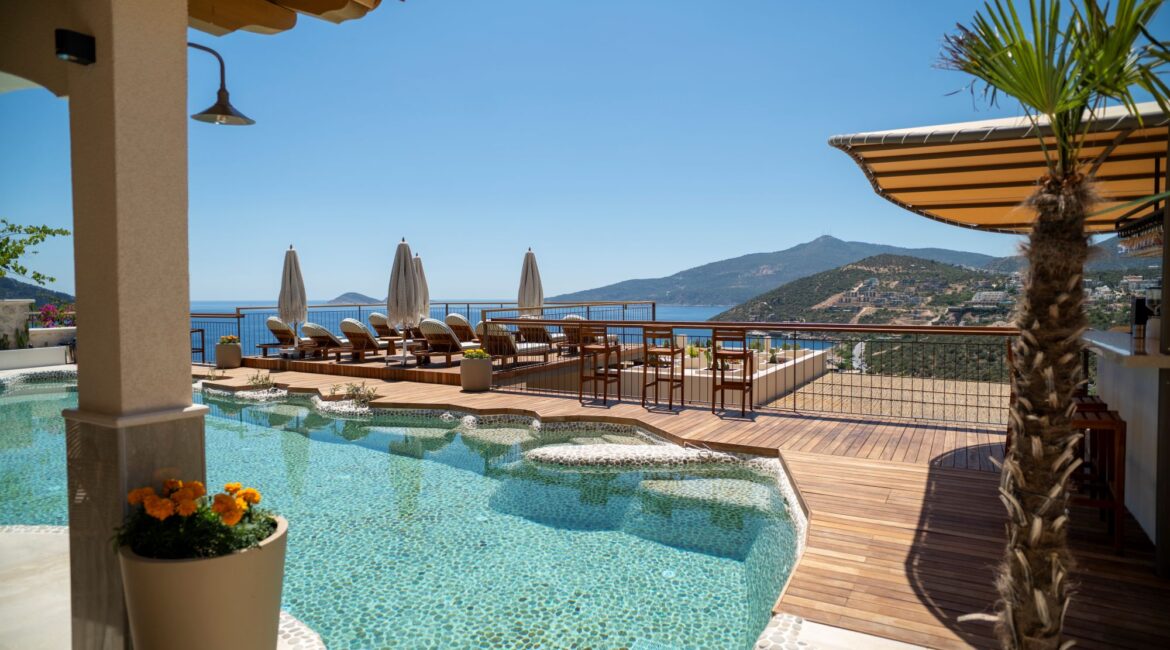 Pebble pool and pool terrace at Casa Pery in Kalkan with panoramic sea views.