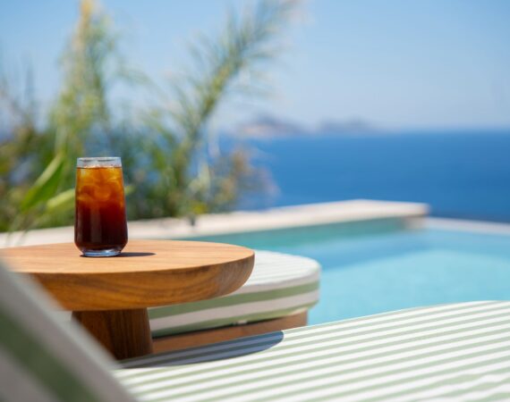 Poolside daybed and refreshments at Casa Pery in Kalkan overlooking the Mediterranean Sea.